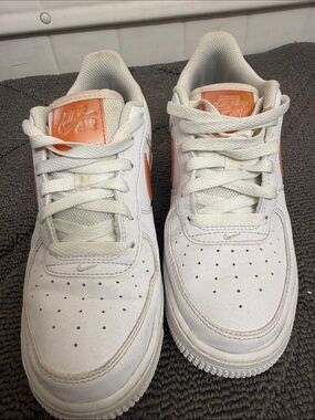 Nike White Low-Top Sneakers with Orange Accents